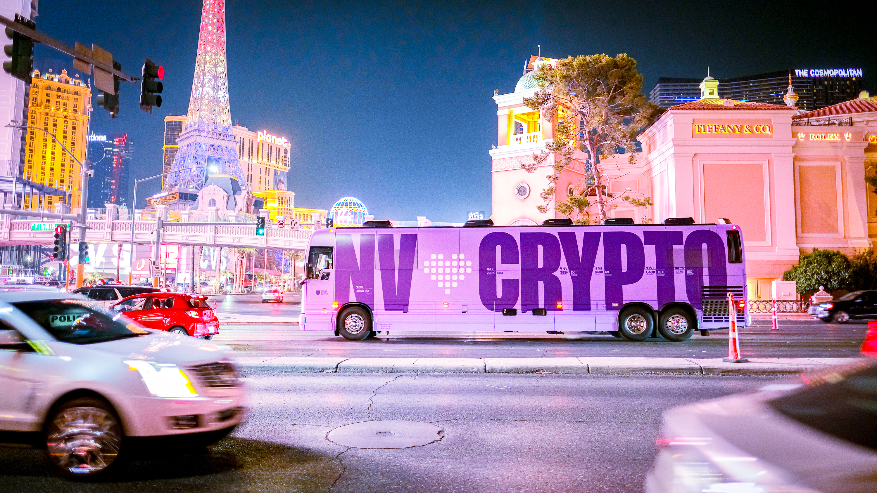 NV Loves Crypto bus on the Las Vegas Strip at night