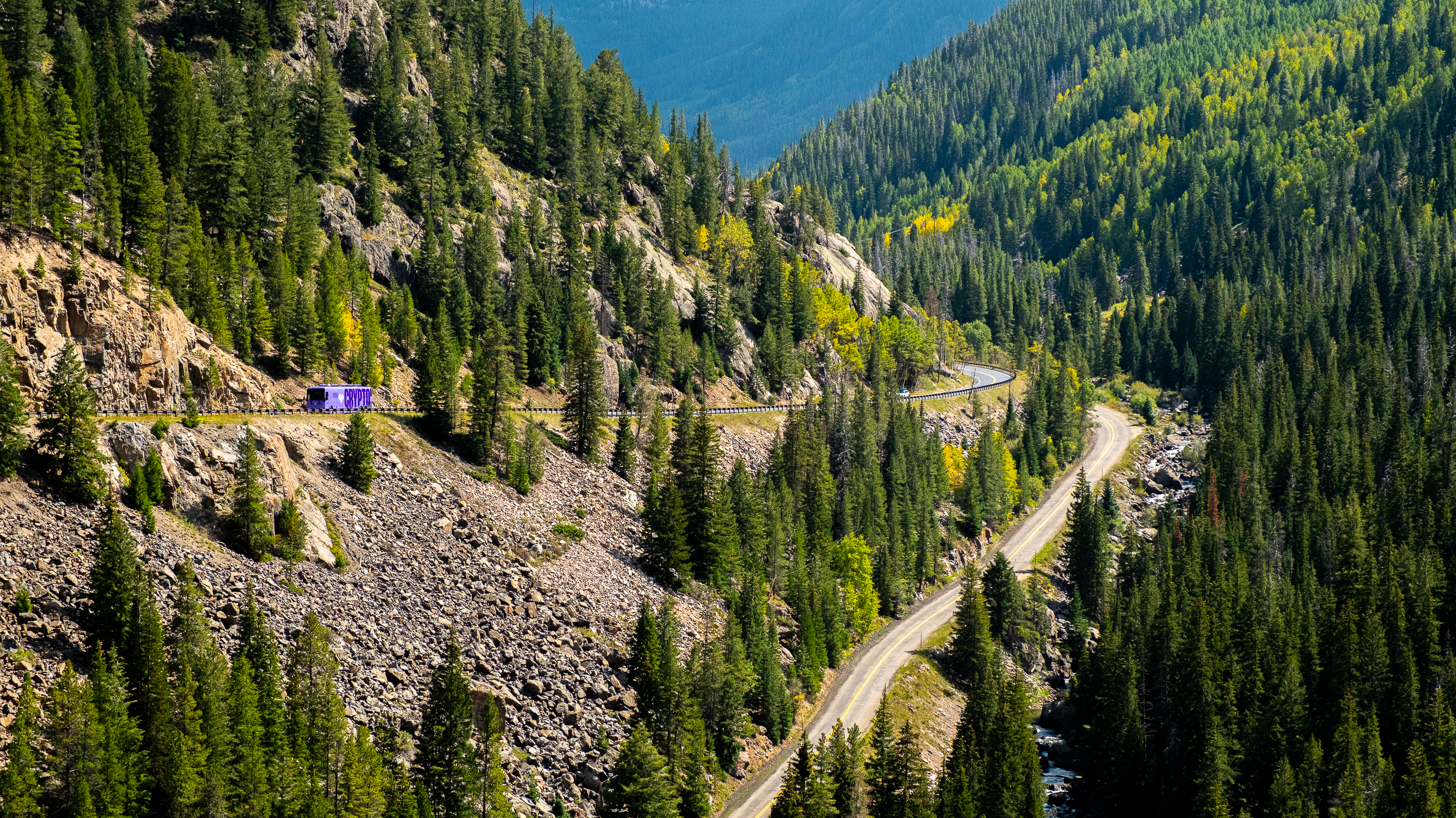 America Loves Crypto bus — Colorado mountain pass