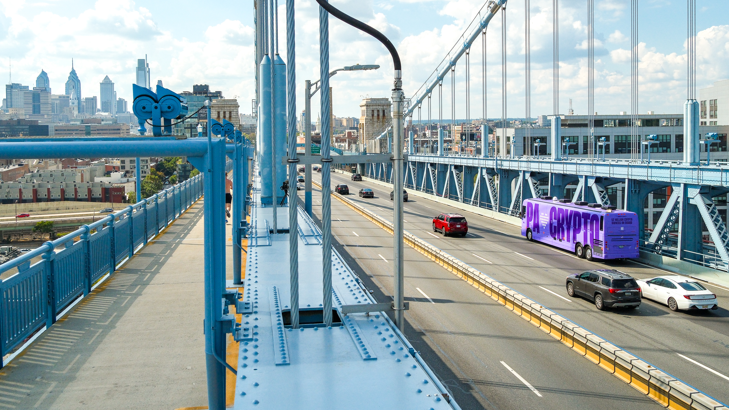 PA Loves Crypto bus on Philadelphia bridge