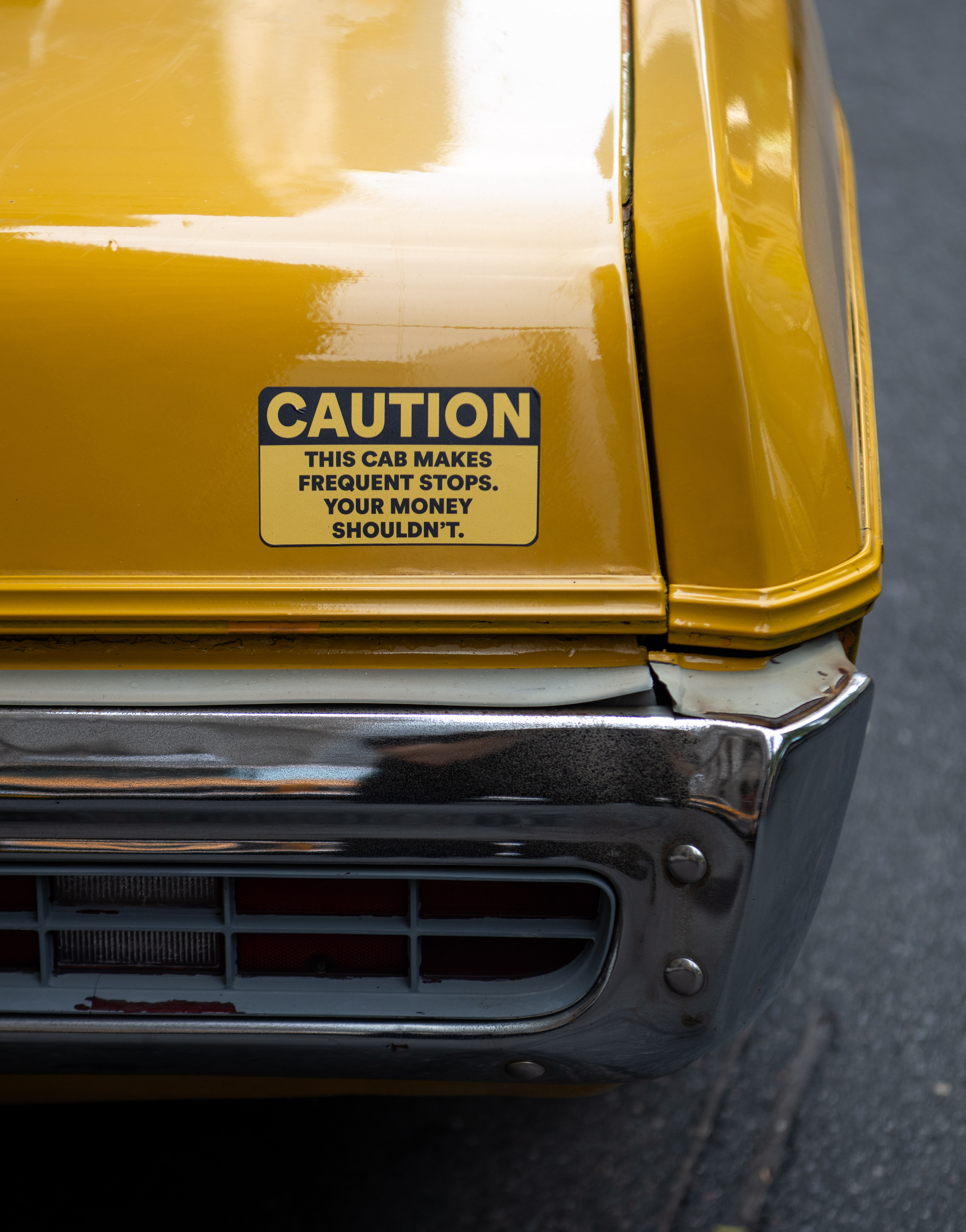 Circle taxi caution sticker — this cab makes frequent stops