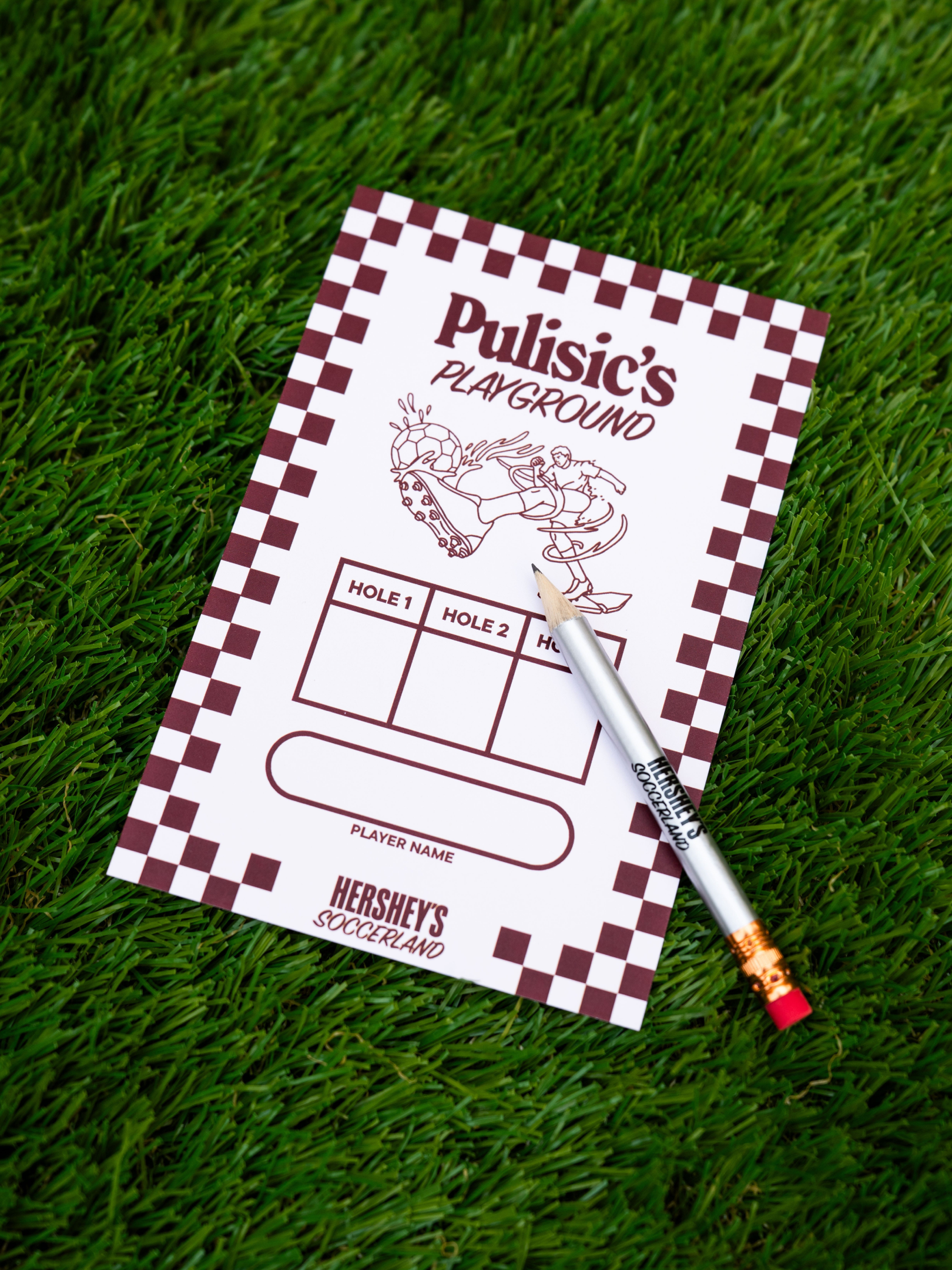Pulisic's Playground foot golf scorecard on turf